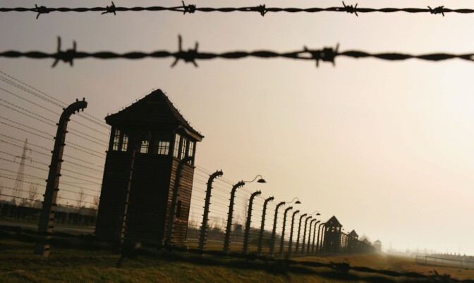BREZEZINKA, POLAND - DECEMBER 10:  Watch towers surrounded by mulitiple high voltage fences, December 10, 2004 at Auschwitz II - Birkenau which was built in March 1942 in the village of Brzezinka, Poland. The camp was liberated by the Soviet army on January 27, 1945, January 2005 will be the 60th anniversary of the liberation of the extermination and concentration camps, when survivors and victims who suffered as a result of the Holocaust will commemorated across the world. (Photo by Scott Barbour/Getty Images)