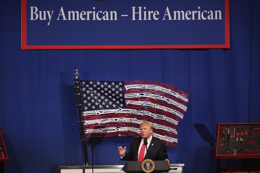 KENOSHA, WI - APRIL 18:  President Donald Trump speaks to workers at the headquarters of tool manufacturer Snap-On on April 18, 2017 in Kenosha, Wisconsin. During the visit, Trump signed an executive order to try to bring jobs back to American workers and revamp the H-1B visa guest worker program.  (Photo by Scott Olson/Getty Images)