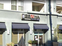 A few of the outside of Genwa KBBQ with the sign above.