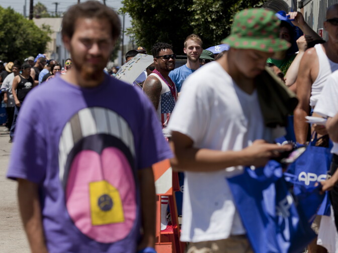 Medical marijuana patients wait in line outside of the new California Heritage Market, a cannabis farmers market in Boyle Heights. The market will be open through July 6 but expects to hold similar events in the future.