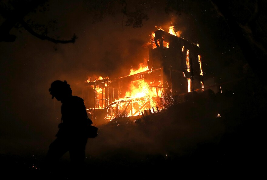 A home is consumed by fire during the Thomas fire on December 7, 2017 in Ojai, California.