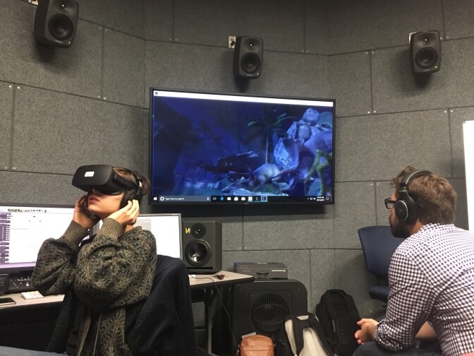 Cal Arts student Sara Suarez walks her classmates and her instructor through a virtual reality environment that she designed the sound for. 