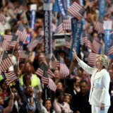 PHILADELPHIA, PA - JULY 28:  Democratic presidential candidate Hillary Clinton acknowledges the crowd as she arrives on stage during the fourth day of the Democratic National Convention at the Wells Fargo Center, July 28, 2016 in Philadelphia, Pennsylvania. Democratic presidential candidate Hillary Clinton received the number of votes needed to secure the party's nomination. An estimated 50,000 people are expected in Philadelphia, including hundreds of protesters and members of the media. The four-day Democratic National Convention kicked off July 25.  (Photo by Joe Raedle/Getty Images)