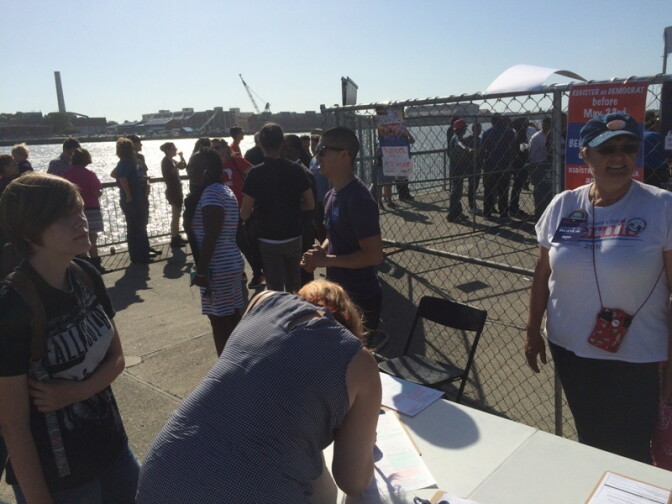 Bernie Sanders campaign volunteers register a voter Wednesday afternoon before a campaign rally in Vallejo.