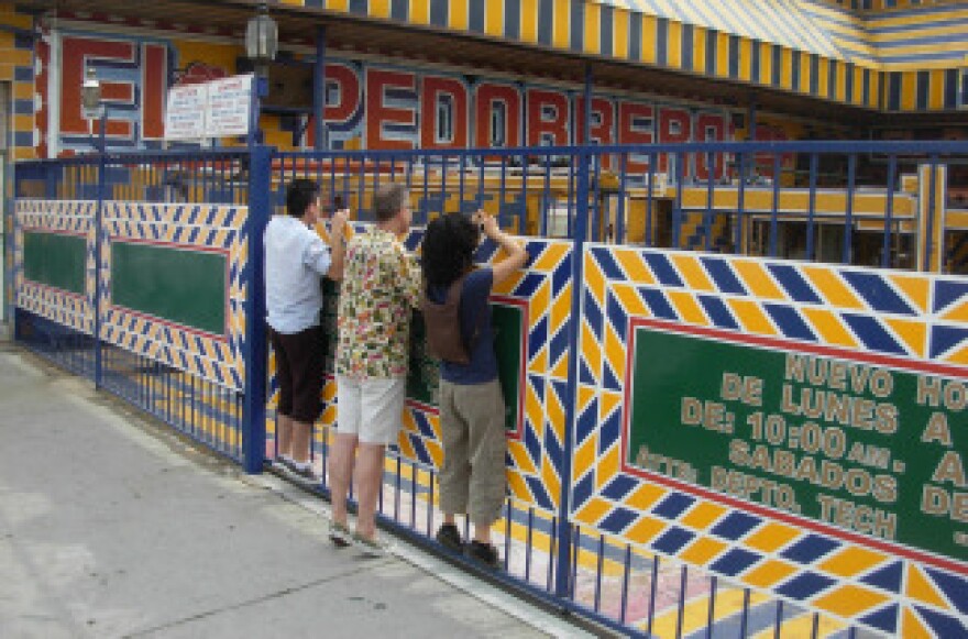 Team Off-Ramp – (L-R) Julian Bermudez, Charles Phoenix, and Queena Kim -- at Whittier Blvd’s most famous muffler shop. Pedorrero means “he who farts.”
