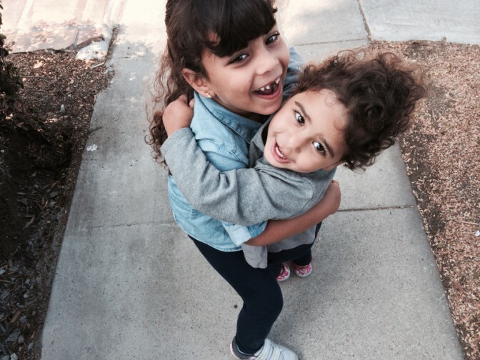 Dina Khalil's youngest daughters are enrolled in Shenandoah Elementary's Family Literacy program and state preschool. Khalil felt like an outsider at the school until she was welcomed into the Family Literacy classroom. 