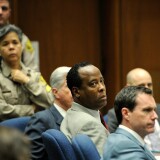 Dr. Conrad Murray (2nd from R) looks toward Los Angeles Deputy District Attorney David Walgren (not pictured) as Walgren delivers his closing arguments during the final stage of Conrad Murray's defense in his involuntary manslaughter trial in the death of singer Michael Jackson at the Los Angeles Superior Court on November 3, 2011 in Los Angeles, California.