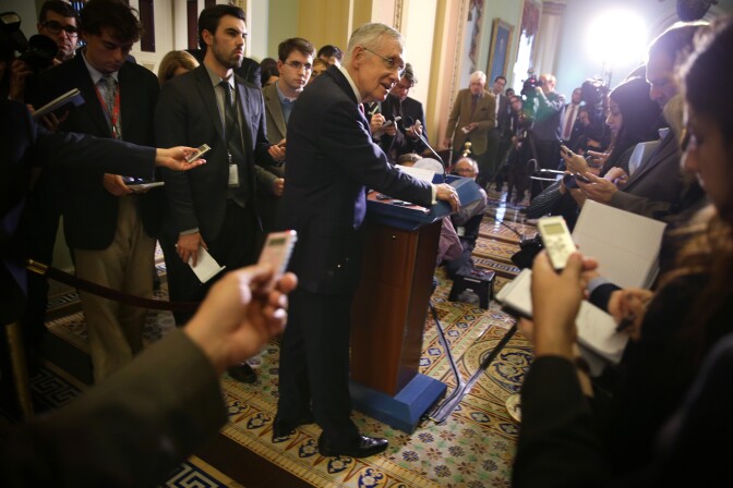 WASHINGTON, DC - DECEMBER 09:  U.S. Senate Majority Leader Sen. Harry Reid (D-NV) (C) speaks to members of the media after the Senate Democratic Policy Luncheon at the Capitol December 9, 2014 on Capitol Hill in Washington, DC. Senator Reid responded to a report on CIA's use of torture conducted by the Senate Intelligence Committee where were released today.  (Photo by Alex Wong/Getty Images)