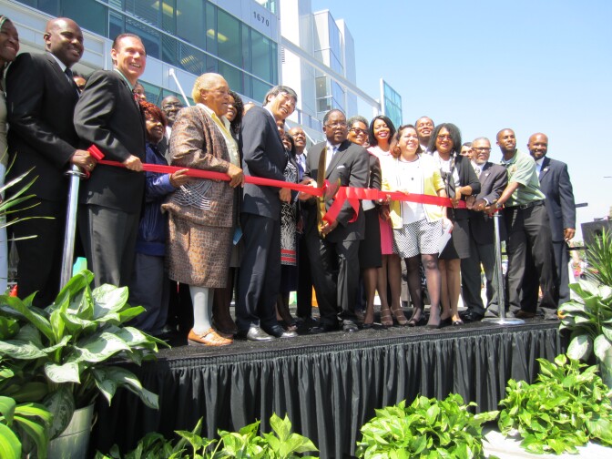 L.A. County Supervisor Mark Ridley-Thomas cuts the ribbon on the new Martin Luther King, Jr. Outpatient Center in south Los Angeles.