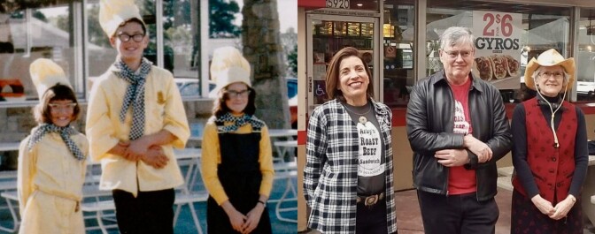 A pair of photos combined together in a collage. The image on the left includes three young children wearing chef hats, yellow shirts, black pants, glasses, and checkered scarves around their necks. The kids are posing in front of outdoor tables on a bright day. The image on the right is a recreation of the one of the left, featuring the same children all grown up decades later. They're still standing in front of the outdoor tables, but the window in the building behind them is plastered with a fast-food advertisement.