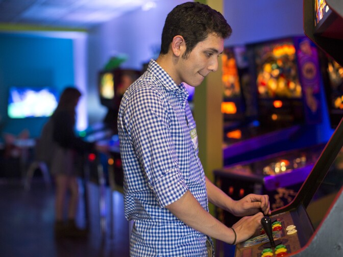 Matthew Martinez plays Marvel Vs. Capcom at Neon Retro Arcade in Pasadena on Wednesday afternoon, Feb. 4. Martinez likes that he can pay for an hour of unlimited games instead of paying for each game individually.