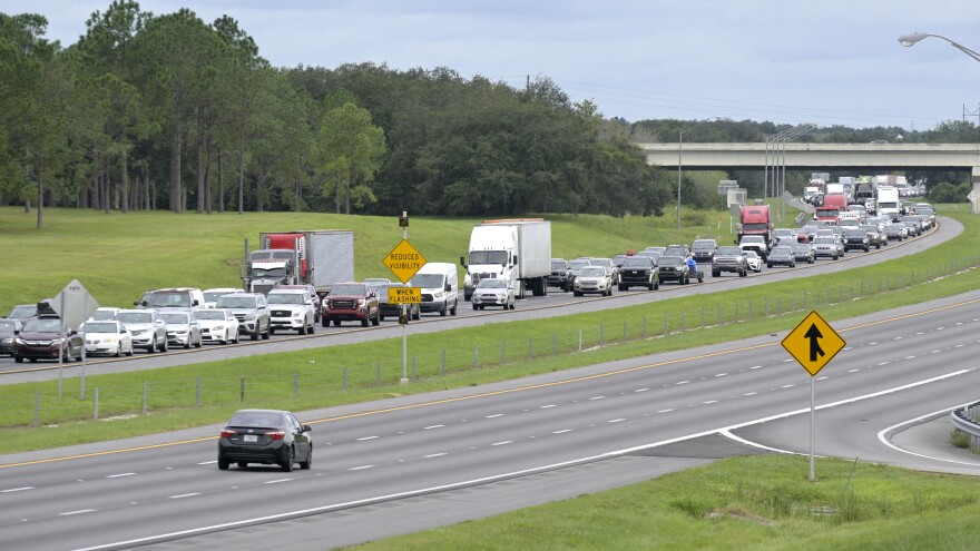 Eastbound traffic crowds Interstate 4 as people evacuate in preparation for Hurricane Ian on Tuesday.