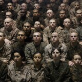 Female and male Marine recruits listen to instructions as they prepare for a swimming test during boot camp February 25, 2013 at MCRD Parris Island, South Carolina. 