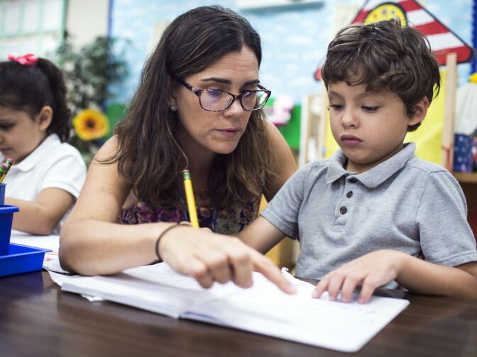 Teacher Cherie Wood, left, works with kindergartener Jeremy Campos at Willard Elementary School in Pasadena, two weeks into the school year, on Wednesday morning, Aug. 31, 2016.