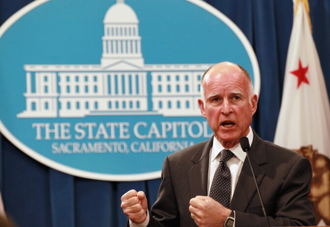 File: California Gov. Jerry Brown speaks to reporters as he announces his proposed budget at the California State Capitol on Jan. 10, 2011 in Sacramento, California.