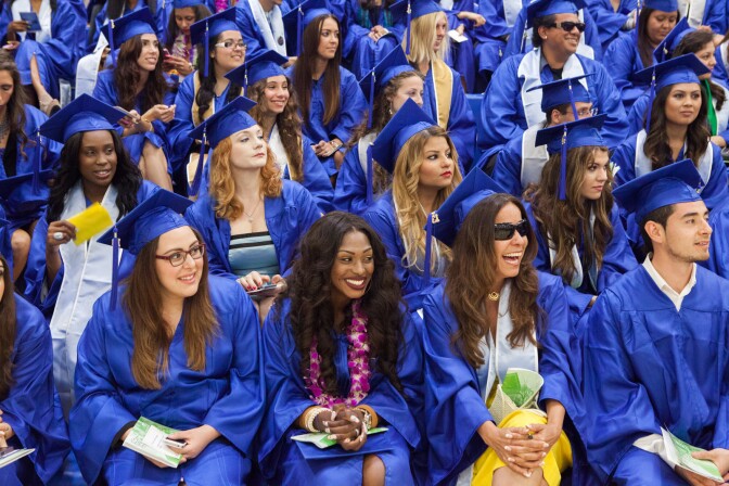 Students gather before graduation at Santa Monica College on June 11th, 2013.