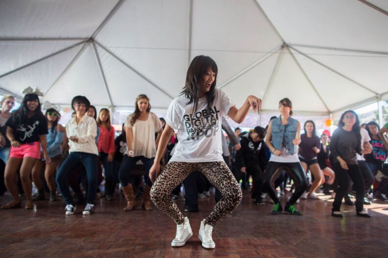 A dance instructor leads a group in one of dozens of choreographed dances tied to individual Korean pop songs at the first-ever KCON convention in Irvine, Calif.