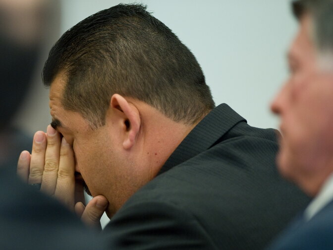  Former Fullerton police officer Manuel Ramos reacts as the not guilty verdict is read in the Kelly Thomas murder trial Monday. He was acquitted of second-degree murder and involuntary manslaughter charges stemming from the 2011 death of transient Kelly Thomas. His lawyer John Barnett is at right.
POOL PHOTO, MINDY SCHAUER, ORANGE COUNTY REGISTER