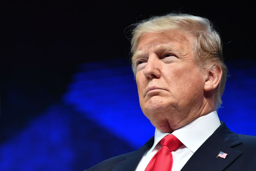 US President Donald Trump looks on during a ceremony before delivering a speech during the World Economic Forum (WEF) annual meeting on January 26, 2018 in Davos, eastern Switzerland.  / AFP PHOTO / Nicholas Kamm        (Photo credit should read NICHOLAS KAMM/AFP/Getty Images)