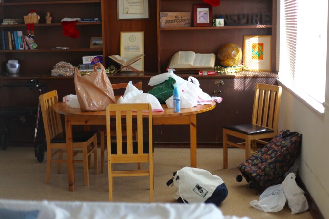 A new residents belongings at Good Shepherd Center. Intake requires new residents to write down everything in their possession before washing their clothes to ensure cleanliness. 