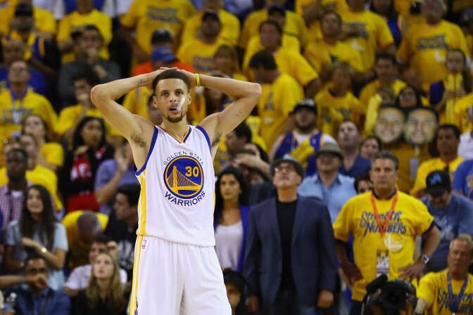 OAKLAND, CA - JUNE 19:  Stephen Curry #30 of the Golden State Warriors reacts during the second half against the Cleveland Cavaliers in Game 7 of the 2016 NBA Finals at ORACLE Arena on June 19, 2016 in Oakland, California. NOTE TO USER: User expressly acknowledges and agrees that, by downloading and or using this photograph, User is consenting to the terms and conditions of the Getty Images License Agreement.  (Photo by Ezra Shaw/Getty Images)