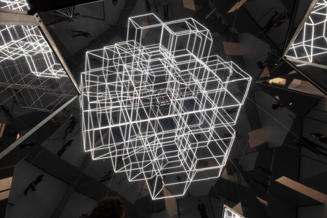 A light installation of geometric shapes reflected by mirrors.