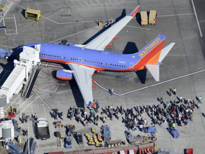 Some LAX passengers were routed onto the tarmac during Friday's shooting incident, a procedure one security consultant says was perfectly safe. 
