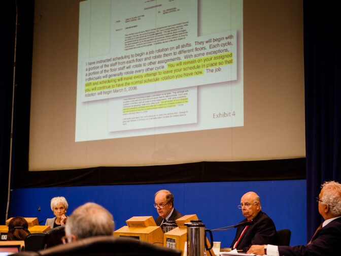 County Supervisors listen as Undersheriff Paul Tanaka responds to questions about an email memo during a hearing regarding allegations of abuse in county jails.