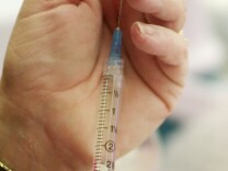  Dixie Morris of the Columbiana County Health Department prepares a meningitis vaccine June 8, 2001 in Salem, OH. Area high school students were required to receive the vaccine after a recent outbreak of the disease. 