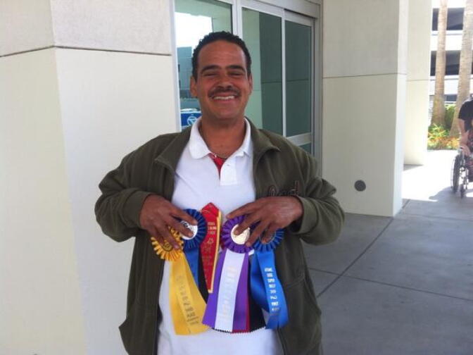 Carl Dixon, from L.A. County, says pit bulls often get a bad rap in media and says his show dogs have won many awards. 