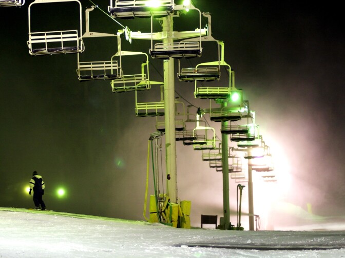 File: Skiers take advantage of well-lit slopes through the night at Mountain High ski resort, Jan. 24, 2001 near Wrightwood, California.
