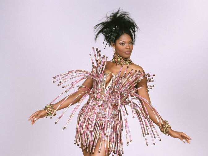 A cocktail dress of silk chine taffeta, horn, plastic and glass beads, horsehair tubing and plastic boning from French designer Tilmann Grawe, 2003-04.