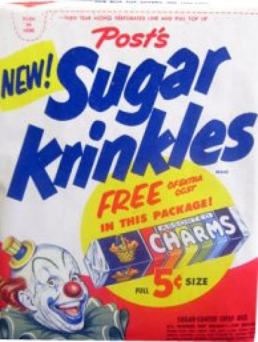 Sugar Krinkles cereal box. They're "just right sweet," Mom.