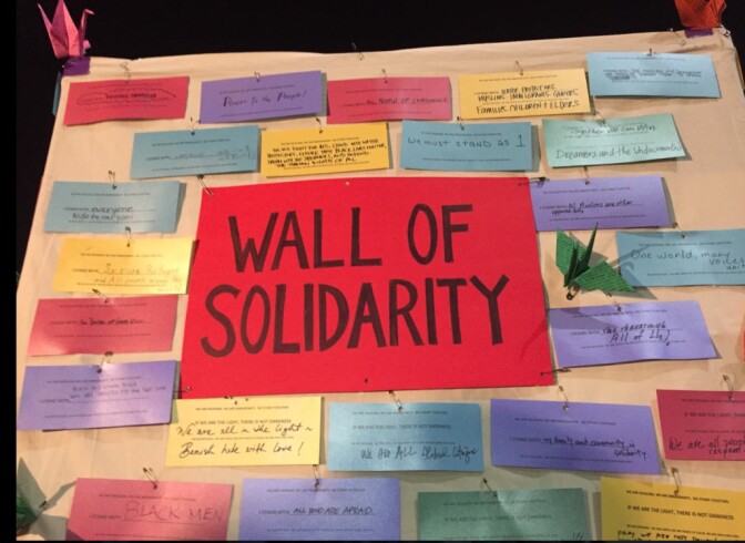 Those attending a vigil and march in Little Tokyo were asked to write messages of support to one another.