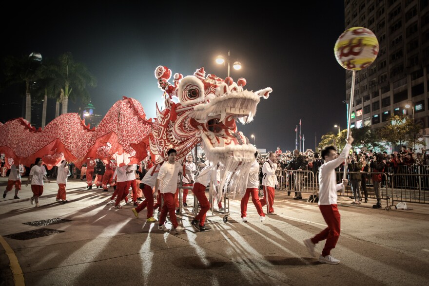 Performers display a dragon dance during a Chinese New Year parade in Hong Kong on January 31, 2014. Chinese communities across Asia have come together to usher in the Year of the Horse. 