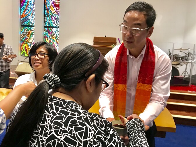 Sam Chung (l.) leads the First Progressive Church of Los Angeles with co-pastor Eula Pagdilao.  