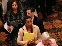 U.S. employers posted fewer job openings in March 2013 compared with February and slowed overall hiring, underscoring a weak month of job growth. The Labor Department said Tuesday that job openings fell 1.4 percent to a seasonally adjusted 3.8 million jobs. (Photo: Job seekers wait in line to meet with a recruiter during the San Francisco job fair. Photo by Justin Sullivan/Getty Images)