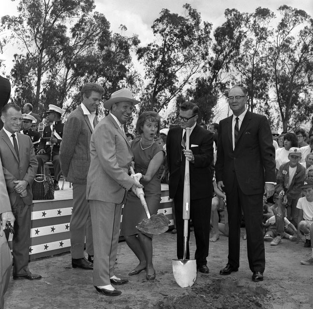 Anaheim Mayor Odra Chandler and contractor Del Webb look on as Angels owner Gene Autry and actress Pat Wymore break ground on Anaheim Stadium on August 30, 1964. 