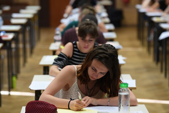 High school students take the philosophy exam, the first test session of the 2017 baccalaureate (high school graduation exam) on June 15, 2017 at the Fustel de Coulanges high school in Strasbourg, eastern France. 

A total of 520.000 Students of general and technological graduating classes  are registered to take their written baccalaureat exams at over 4 400 examination centres across France between June 15-June 22, 2017. / AFP PHOTO / FREDERICK FLORIN        (Photo credit should read FREDERICK FLORIN/AFP/Getty Images)