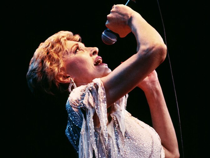 A new biography sees past Tammy Wynette's glittery costumes to examine the singer's deepest struggles.