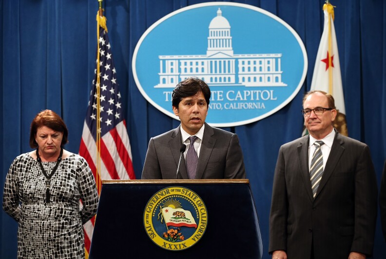 SACRAMENTO, CA - MARCH 19: California Senate President pro Tempore Kevin de Leon (C) speaks as Assembly Speaker Toni Atkins (L) and Sen. Bob Huff (R) (R-Diamond Bar) look on during a news conference to announce emergency drought legislation on March 19, 2015 in Sacramento, California. As California enters its fourth year of severe drought, California Gov. Jerry Brown joined Senate President pro Tempore Kevin de Leon, Assembly Speaker Toni Atkins, Republican Leaders Senator Bob Huff and Assemblymember Kristin Olsen to announce emergency legislation that aims to assist local communities that are struggling with devastating drought. The $1 billion package is designed to expedite bond funding to help ensure that all Californians have access to local water supplies. (Photo by Justin Sullivan/Getty Images)