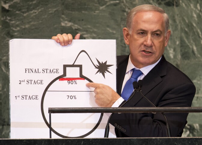 Benjamin Netanyahu, Prime Minister of Israel, uses a diagram of a bomb to describe Iran's nuclear program while delivering his address to the 67th United Nations General Assembly meeting September 27, 2012 at the United Nations in New York.