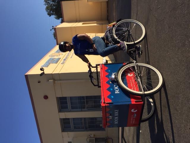 Children's librarian Ednita Kelly started the Los Angeles Public Library book bike program, delivering books to elementary schools in San Pedro.