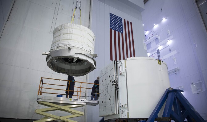 Expandable habitat from Bigelow Aerospace being lifted into Dragon's trunk for a ride to the space station.