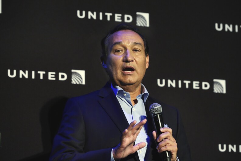 United Airlines CEO Oscar Munoz delivers remarks Thursday, June 2, 2016, in New York, during a presentation of the carrier's new Polaris service, a new business class product that will become available on trans-Atlantic flights. (AP Photo/Richard Drew)