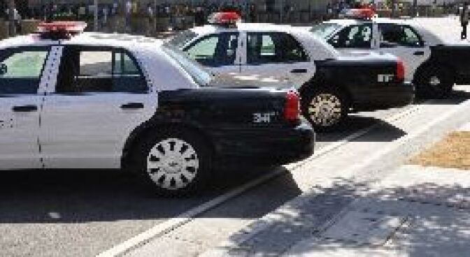 LAPD patrol cars are parked outside of Staples Center on June 16, 2010 before Game 7 of the NBA Finals in downtown Los Angeles