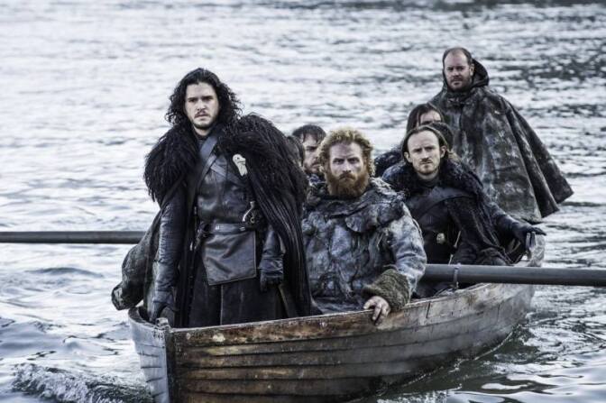 Know-nothing Jon Snow rides in a boat with other characters from HBO's juggernaut 'Game of Thrones.'
