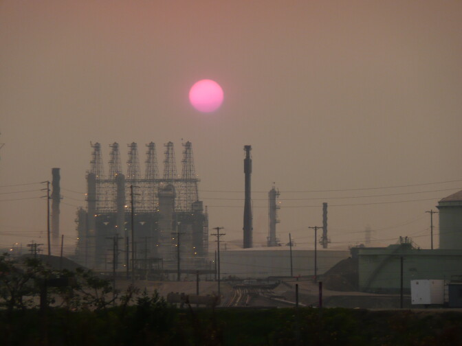 This is the sun setting over the Chevron refinery in El Segundo