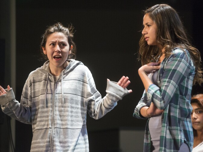 Actresses Angela Rosado, left and Leslie Espinoza play Natalia and Tiffany in the School of History & Dramatic Arts' performance of "Kaleidoscope" at Burbank Middle School on Friday, April 29, 2016. The cast and crew of the original play is made up of twenty students.