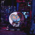 The cartoon character Arnold from Hey Arnold! is on a kick drum 